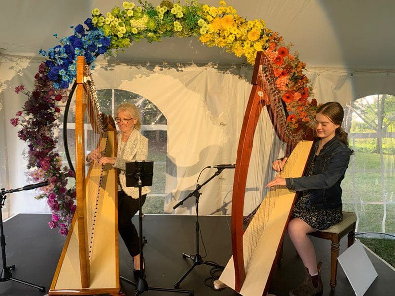 Martha Lawrance performing with a student