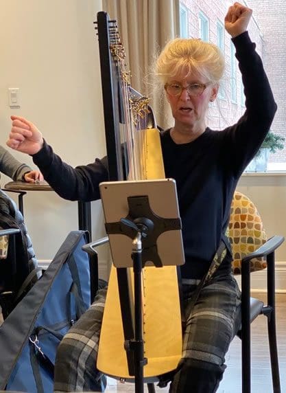 Martha Lawrance playing harp