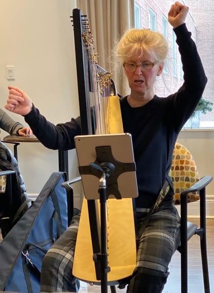 Martha Lawrance playing harp Martha Lawrance playing harp